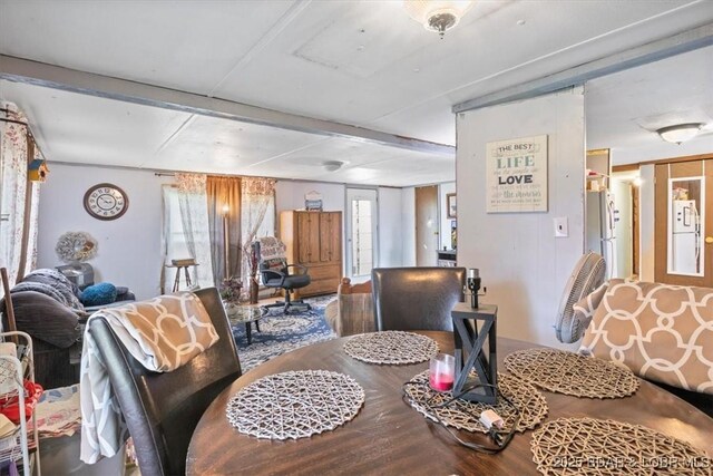 dining space featuring wood finished floors