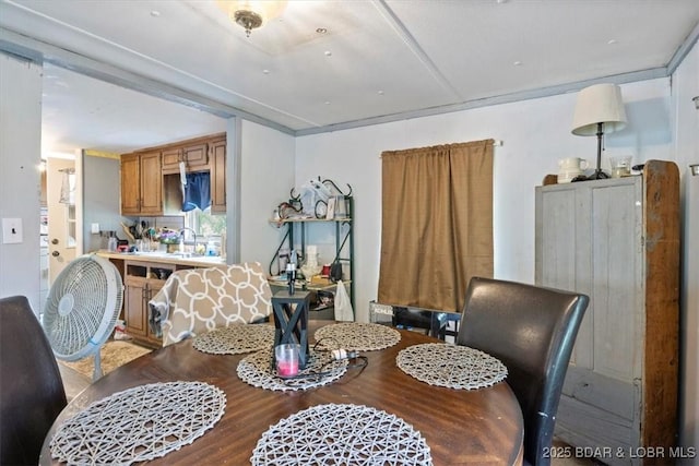dining space featuring wood finished floors