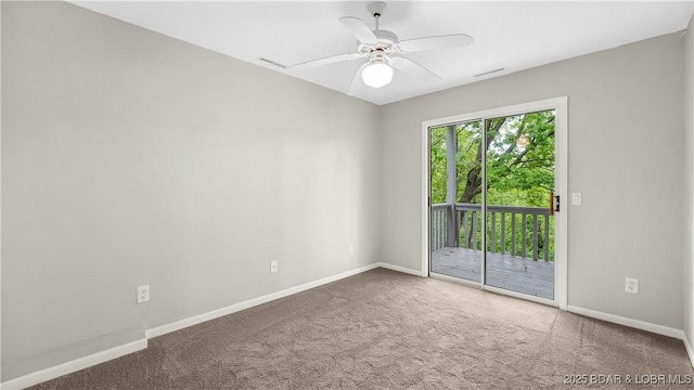 carpeted empty room with baseboards and ceiling fan