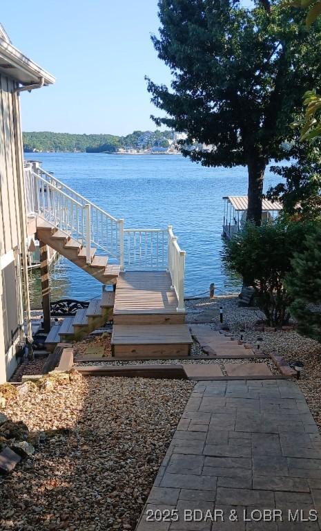50 Shannon Cir, Sunrise Beach, MO 65079 - dock area with a water view and stairway