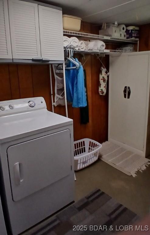 50 Shannon Cir, Sunrise Beach, MO 65079 - clothes washing area with washer / clothes dryer and cabinet space