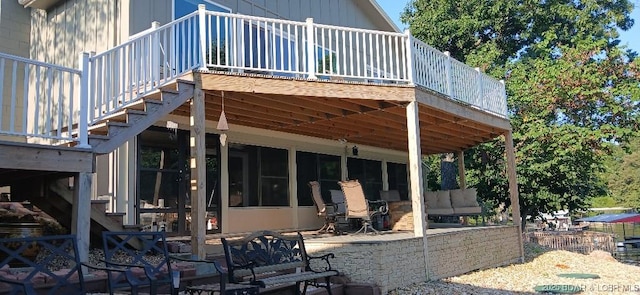 50 Shannon Cir, Sunrise Beach, MO 65079 - back of house with a wooden deck