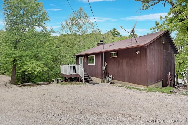 26553 Mesa Dr, Rocky Mount, MO 65072 - rear view of house with a deck and a chimney