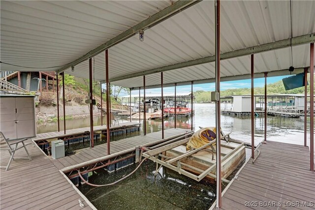 26553 Mesa Dr, Rocky Mount, MO 65072 - dock area featuring a water view and boat lift