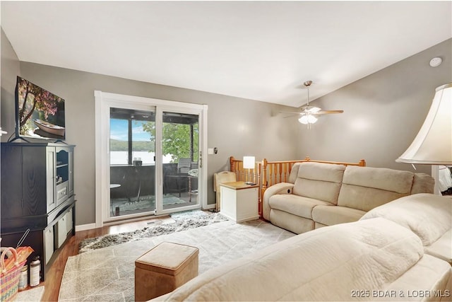 26553 Mesa Dr, Rocky Mount, MO 65072 - living area featuring light wood-style flooring, ceiling fan, and lofted ceiling