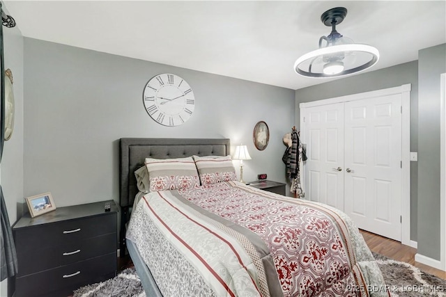 26553 Mesa Dr, Rocky Mount, MO 65072 - bedroom with wood finished floors and a closet