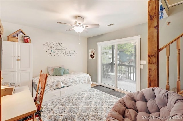 26553 Mesa Dr, Rocky Mount, MO 65072 - bedroom featuring access to outside, a ceiling fan, and carpet floors
