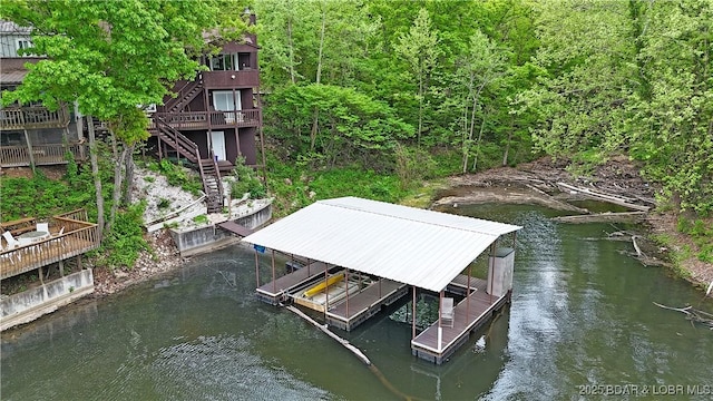 26553 Mesa Dr, Rocky Mount, MO 65072 - dock with stairs, a water view, and boat lift