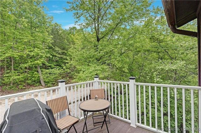 26553 Mesa Dr, Rocky Mount, MO 65072 - wooden deck featuring grilling area and a view of trees