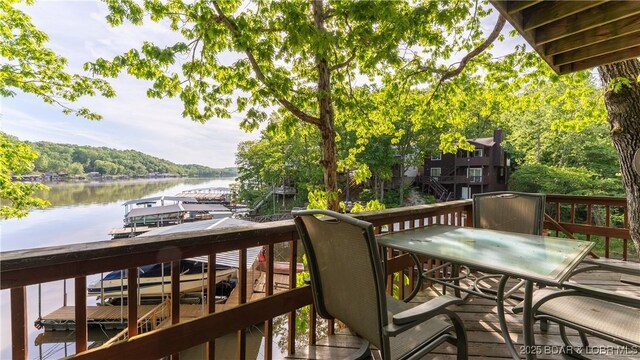 26505 Mesa Dr, Rocky Mount, MO 65072 - balcony featuring a water view and a boat dock