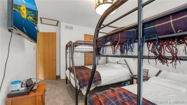26505 Mesa Dr, Rocky Mount, MO 65072 - bedroom with carpet floors and attic access