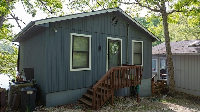 26505 Mesa Dr, Rocky Mount, MO 65072 - back of property with cooling unit