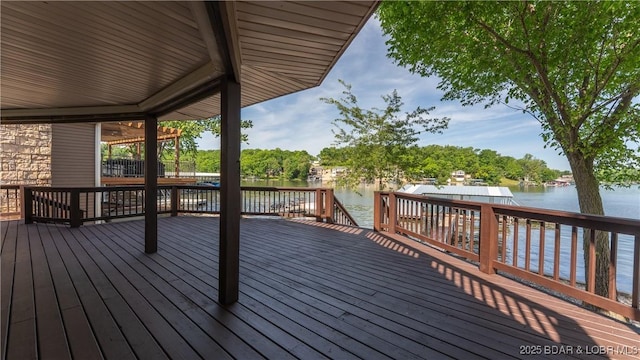 wooden terrace with a water view