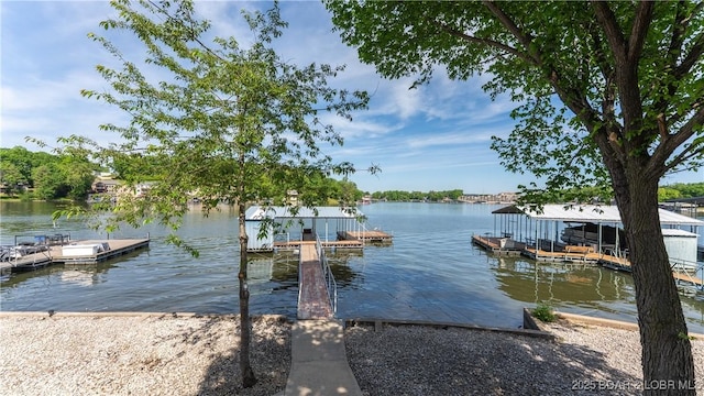 dock area featuring a water view