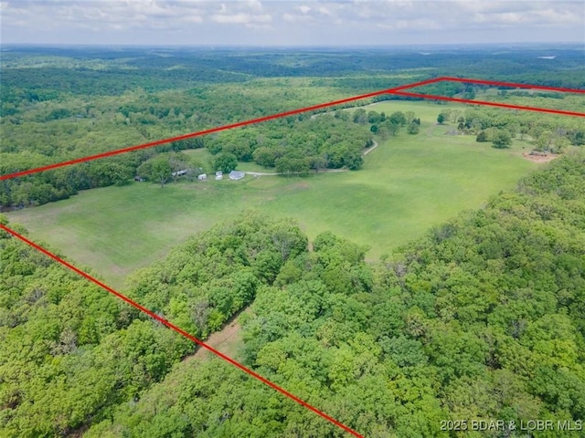overview of rural landscape featuring property boundaries highlighted and a heavily wooded area