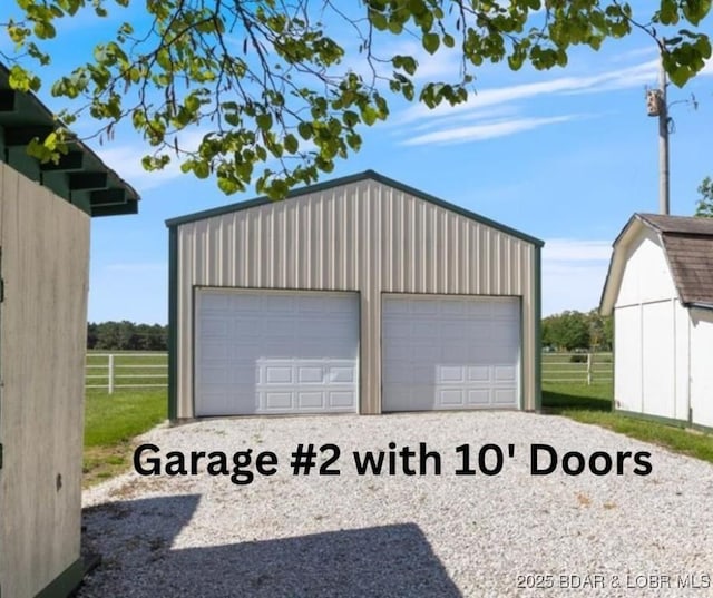 detached garage with fence