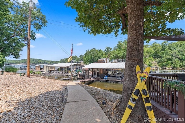 33367 Emerald Rd, Sunrise Beach, MO 65079 - dock featuring boat lift
