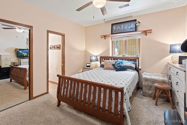 33367 Emerald Rd, Sunrise Beach, MO 65079 - carpeted bedroom with ceiling fan and baseboards