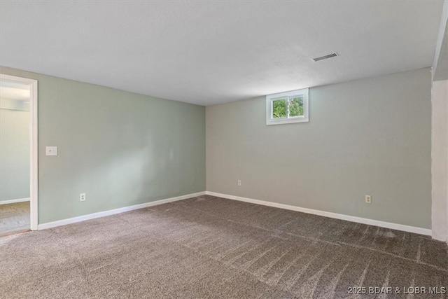 basement featuring carpet and baseboards