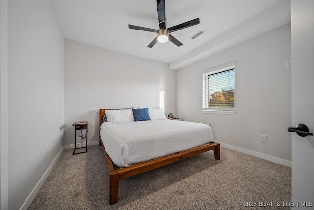 bedroom with carpet flooring, baseboards, and a ceiling fan