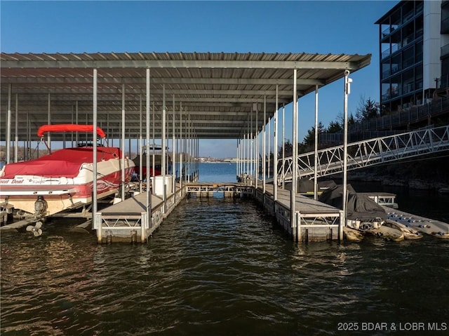 dock with a water view and boat lift