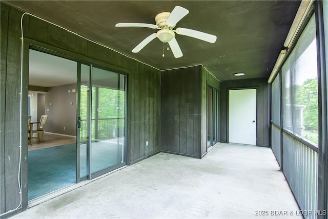 unfurnished sunroom featuring plenty of natural light