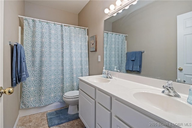 bathroom with toilet, double vanity, and a shower with curtain