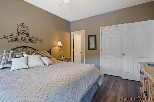 bedroom with dark wood-style floors