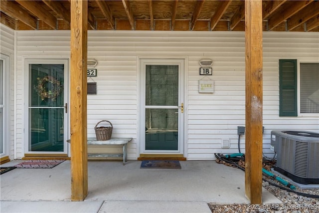 property entrance with central AC unit