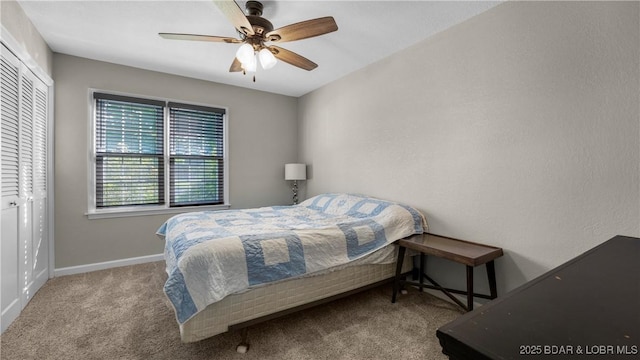 907 Sunnyview Cir, Eldon, MO 65026 - carpeted bedroom with baseboards and ceiling fan