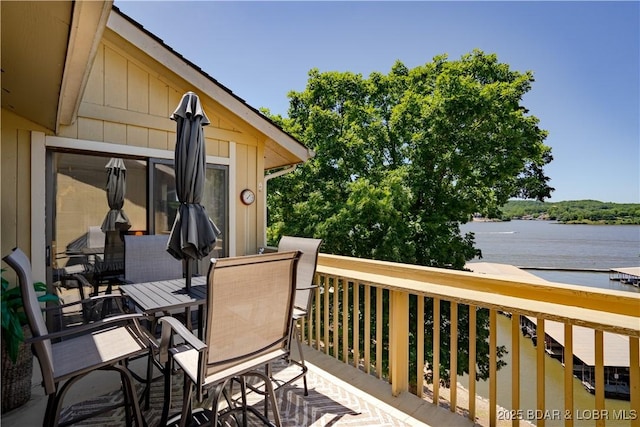 deck featuring a water view