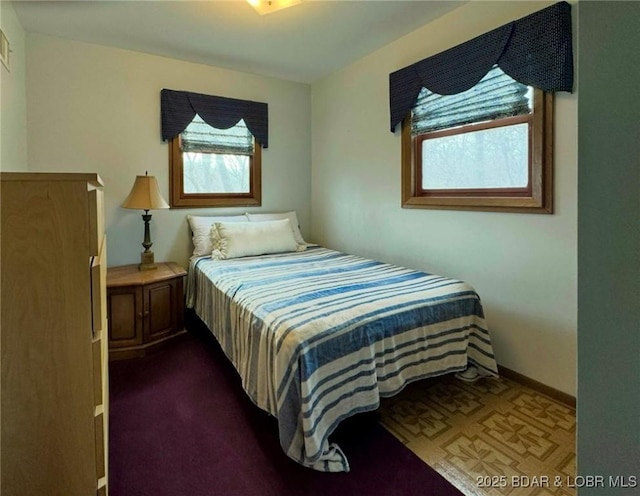 30020 Cool Valley Dr, Rocky Mount, MO 65072 - bedroom with dark carpet and baseboards