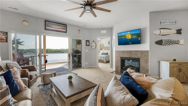 186 Sunset Palms Dr Unit 3C, Camdenton, MO 65020 - living area featuring ceiling fan, carpet floors, and a fireplace