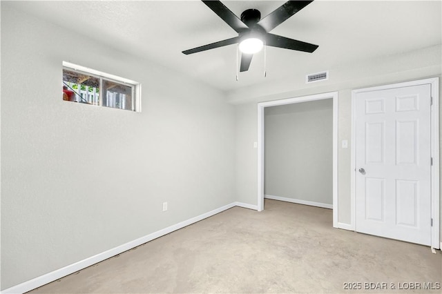 unfurnished bedroom featuring baseboards and ceiling fan