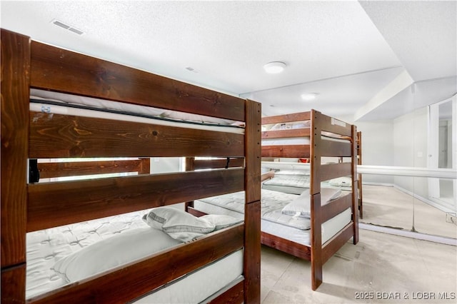 bedroom with a textured ceiling