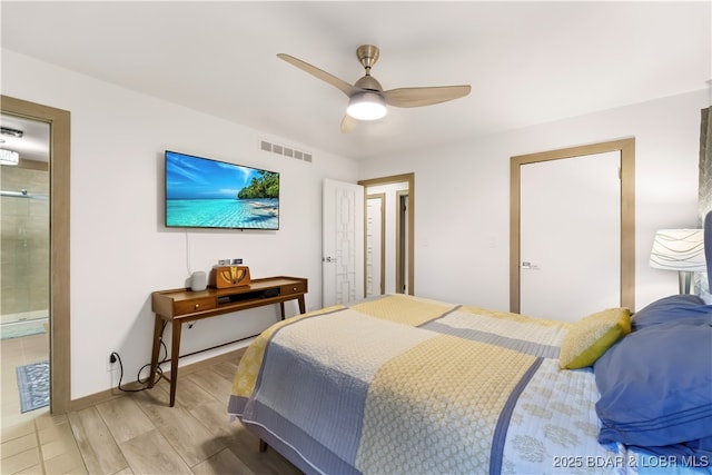 bedroom featuring light wood finished floors, connected bathroom, and ceiling fan