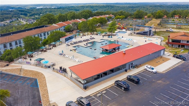19 Casa Blanca Ct Unit 219, Lake Ozark, MO 65049 - drone / aerial view of a pool area