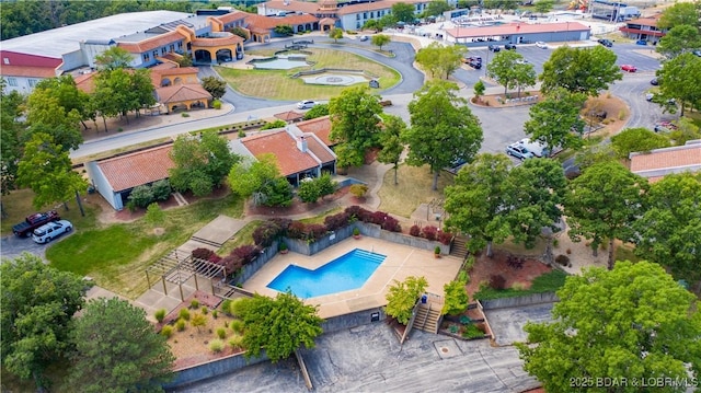 19 Casa Blanca Ct Unit 219, Lake Ozark, MO 65049 - drone / aerial view of a pool