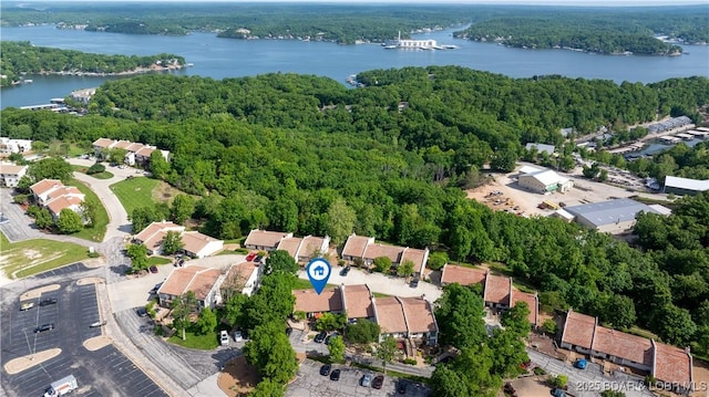 19 Casa Blanca Ct Unit 219, Lake Ozark, MO 65049 - aerial view of property and surrounding area featuring a nearby body of water and a forest