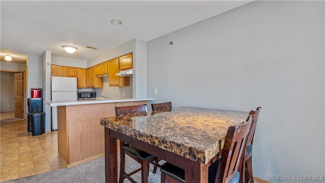 dining area with light floors