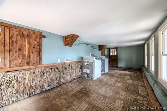 interior space featuring washing machine and clothes dryer