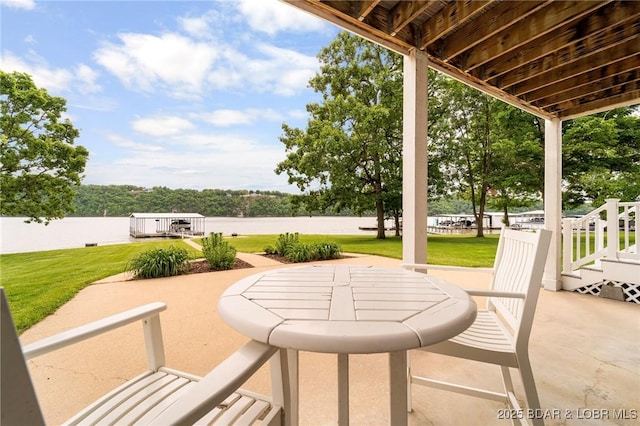 view of patio / terrace featuring a water view