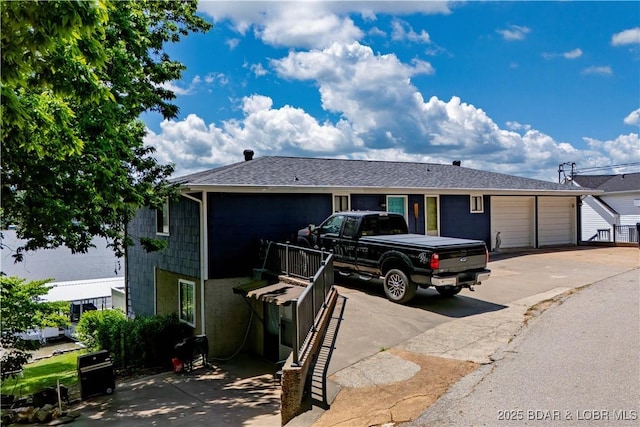 view of front of home with concrete driveway