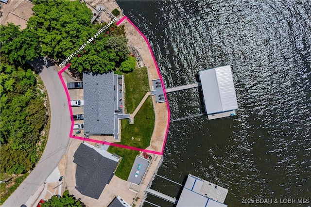 view of property location with property boundaries highlighted and a large body of water
