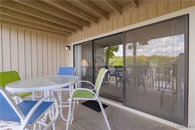 deck with outdoor dining space