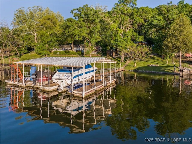 dock featuring boat lift and a water view