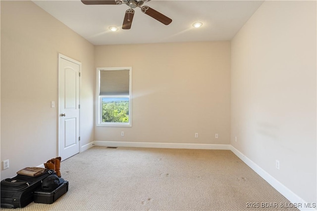 22714 Lake Ridge Dr, Warsaw, MO 65355 - empty room featuring a ceiling fan, light carpet, baseboards, and recessed lighting