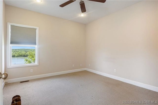 22714 Lake Ridge Dr, Warsaw, MO 65355 - carpeted spare room with ceiling fan, baseboards, and recessed lighting