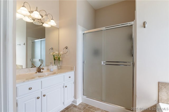 22714 Lake Ridge Dr, Warsaw, MO 65355 - full bath with a shower stall, vanity, a chandelier, and tile patterned floors