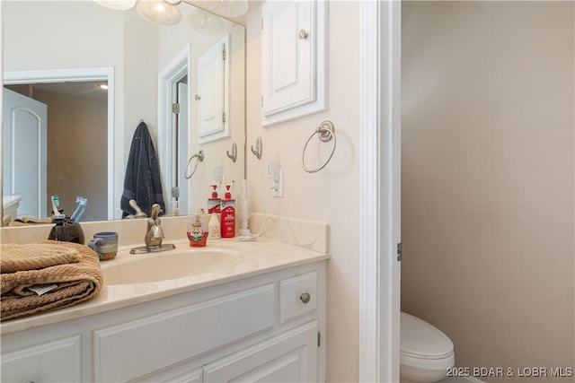 22714 Lake Ridge Dr, Warsaw, MO 65355 - bathroom featuring vanity and toilet